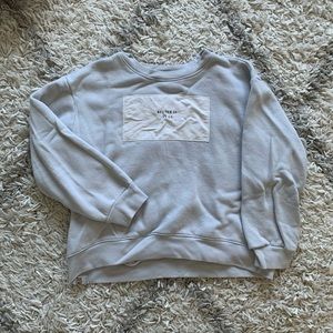 GUC cropped Peloton “Better is in us” sweatshirt